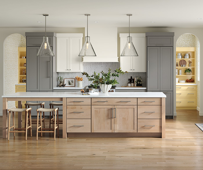 Tri-color kitchen — white, grey, and natural wood island
