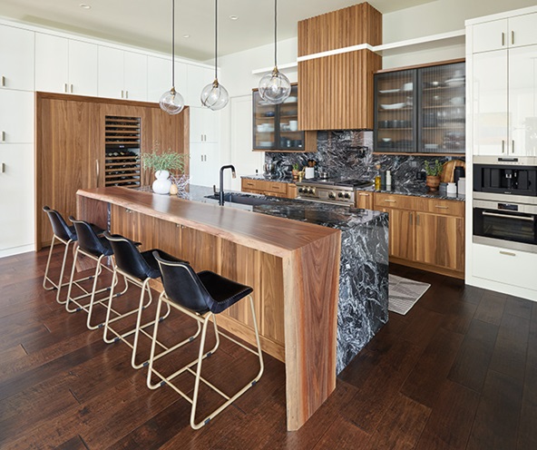 Walnut kitchen with live-edge island and marble backsplash