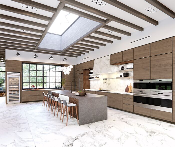 Custom walnut flat-panel cabinets — dramatic skylight kitchen