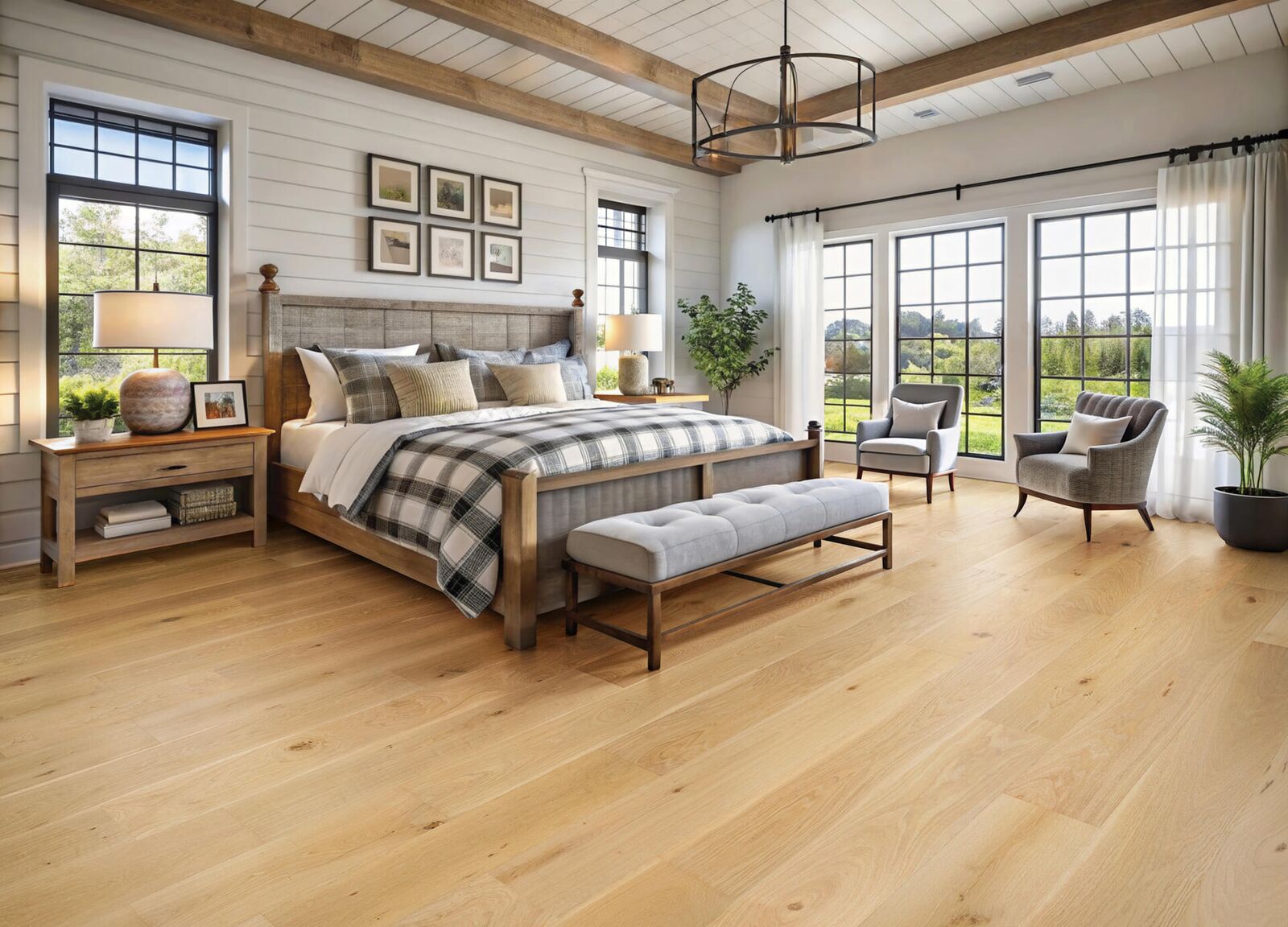 Hardwood — light oak in farmhouse master bedroom with beam ceiling